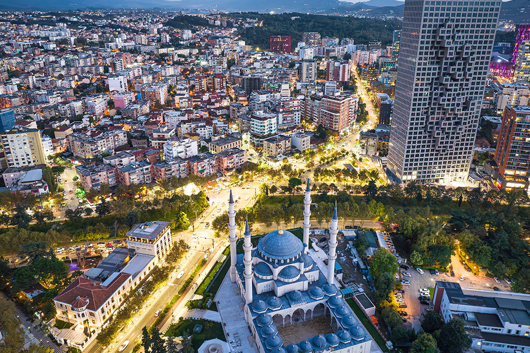 Aerial image of Tirana city skyline on early evening